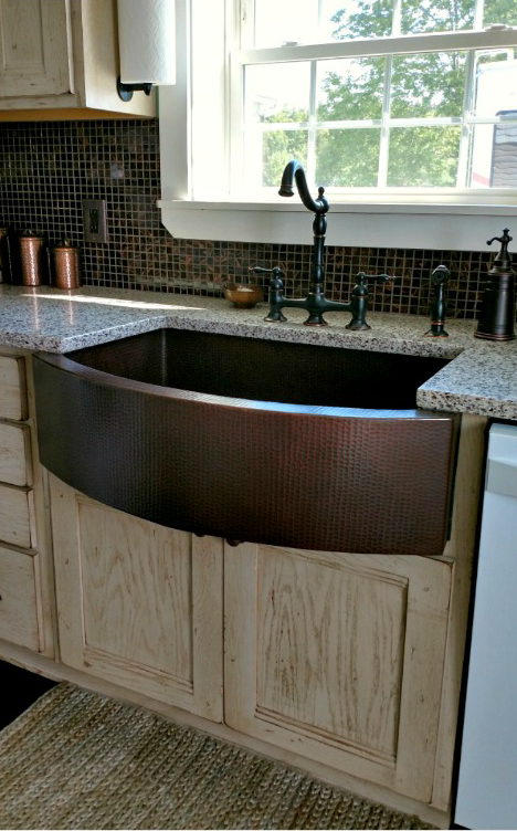 Rounded front coper kitchen sink