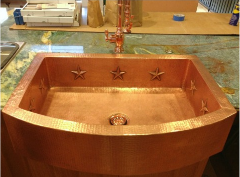 Copper kitchen sink with star design